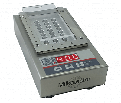Sistema de detección de antibióticos en leche, dispositivo con micropocillos y pantalla digital.